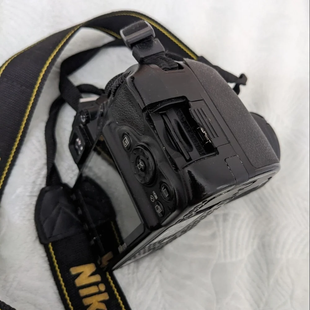 Nikon Black DSLR Camera with Lens